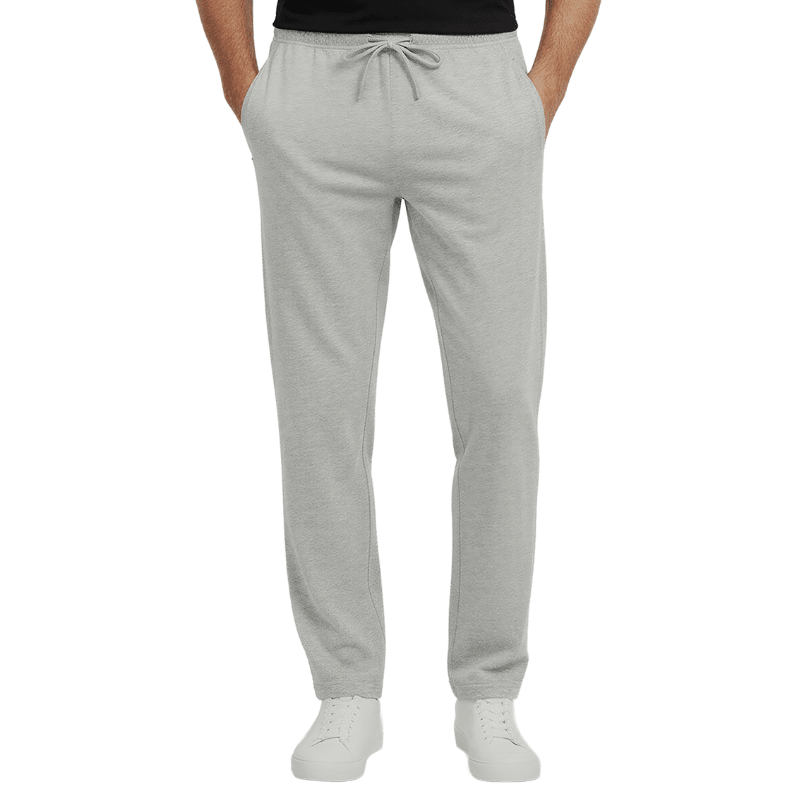 Pantaloni da jogging grigi con coulisse in vita e tasche con cerniera, visti frontalmente su una persona