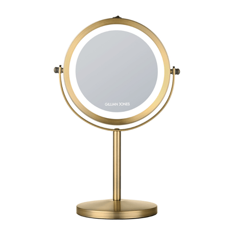 Specchio trucco rotondo dorato con luce LED, vista frontale con logo Gillian Jones