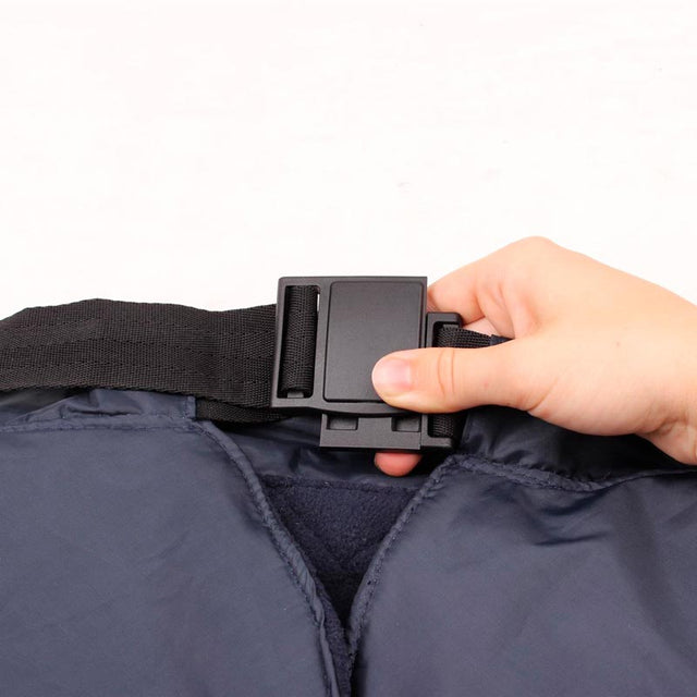 Lined rain cover with pocket and magnetic closure